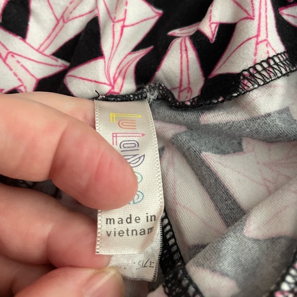 Incredibly unique paper airplane leggings. Great condition. - Picture 5 of 6